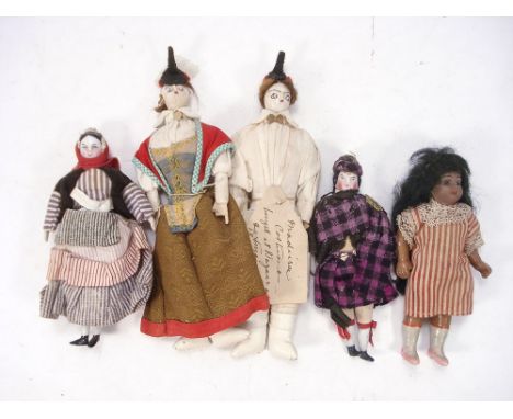 A group of five late 19th /early 20th century costume dolls:, porcelain and cloth head examples, two with manuscript labels '
