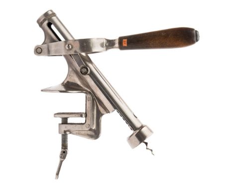 A Swiss made nickel plated 'Rapid' bar corkscrew:, with turned beech handle, signed to body as per title, 28cm long.