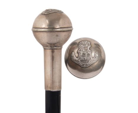 A 20th century ebonised and silver plate mounted walking stick:  the pommel with Prince of Wales Regimental badge, 95cm. long