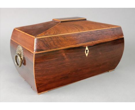 A late Regency rosewood boxwood banded sarcophagus shape tea caddy, with two lidded compartments and associated glass mixing 