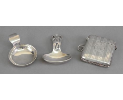 A large silver engine turned vesta case, George Unite, Birmingham 1920, monogrammed, 4.5 x 5cm, a silver caddy spoon, D N Hal