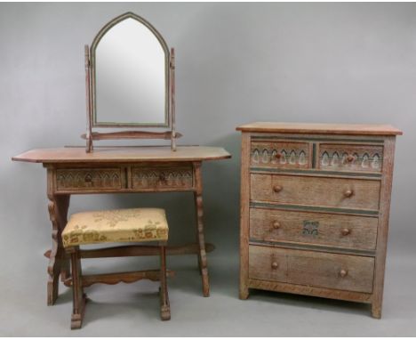 A limed polychrome painted and carved oak bedroom suite, in 17th century style, of panelled construction, comprising; a dress