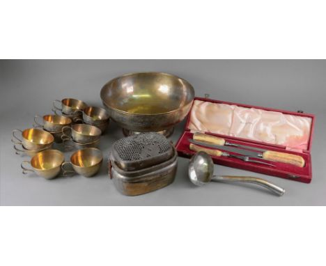 A gilt metal rounded rectangular pot pourri basket, 20th century, with pierced pull-off cover and swing handle, 20cm wide, a 
