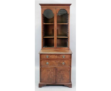 A George III style mahogany satinwood crossbanded boxwood and ebony strung bookcase and associated cabinet, 19th century, the