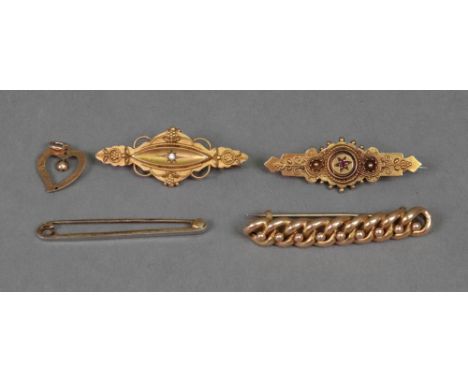 A Victorian 15ct gold bar brooch, of shaped outline, set with a diamond, 3.5cm wide, another star set with a ruby, a two colo