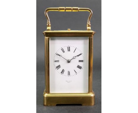 Hall &amp; Co Paris: A large brass cased carriage clock, late 19th / early 20th century, with push repeat and striking on a g