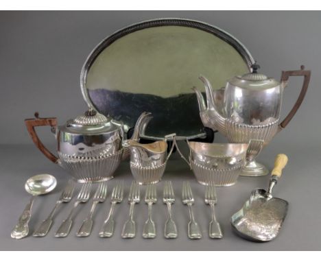 A George III style oval electroplate gallery tray, with slat pierced sides, 46cm wide, pair of oval entree dishes, 31cm wide,