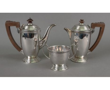 An Art Deco silver three-piece cafe au lait service, A.E. Poston &amp; Co, Birmingham 1937, with ribbon tied swag upper friez