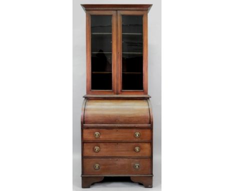 An Edwardian mahogany satinwood crossbanded boxwood and ebony strung cylinder front bureau bookcase, with glazed upper part a