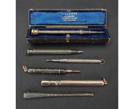 An S Mordan 9ct gold propelling pen, with engine turned decoration; a diamond-set silver and gold propelling pencil; three fu