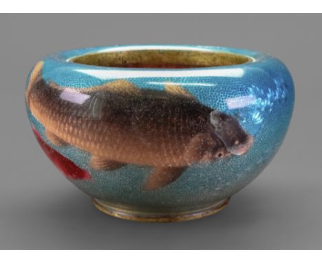 A Japanese ginbari enamel circular bowl, Meiji period, worked with three swimming fish on a graduated blue ground, signed, 16