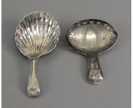 A George III silver bright cut engraved caddy spoon, Joseph Taylor, Birmingham 1806, the oval bowl with pierced border and va