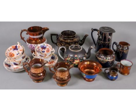 A set of six Victorian Gaudy Welsh tea cups and saucers, four copper lustre jugs of varying sizes, a small mug and a bowl, 19