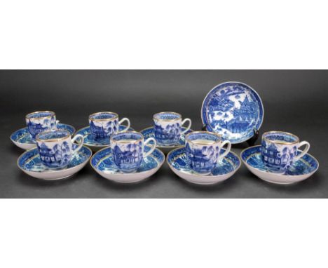 A group of seven Chinese Export blue and white coffee cups, circa 1800, each painted with pavilions in a river landscape also