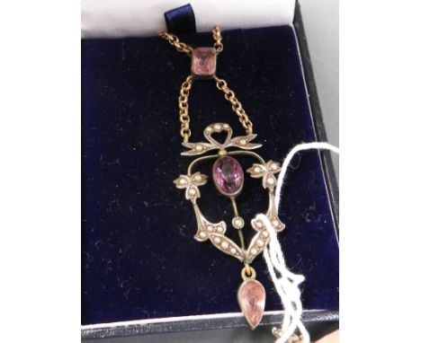 An Art Nouveau period pendent and German seed pearl brooch