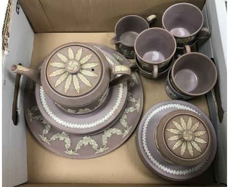 A Wedgwood Jasper ware part tea set with lilac ground comprising teapot, lidded sugar bowl, milk jug, six cups and saucers, s