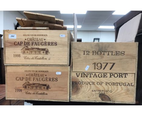 Three various wooden wine boxes including Dows 1977 Vintage Port (12 bottle), Chateau Cap de Faugères Côtes-de-Castillon 1998