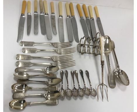 A collection of silver cutlery comprising two Victorian "Fiddle" pattern tablespoons (by Joseph and Albert Savory, London 184