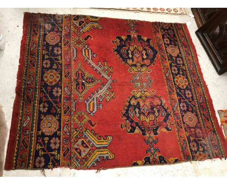 A collection of seven various vintage Ushak carpet fragments varying sizes, the biggest approx. 155 cm x 189 cm, the smallest