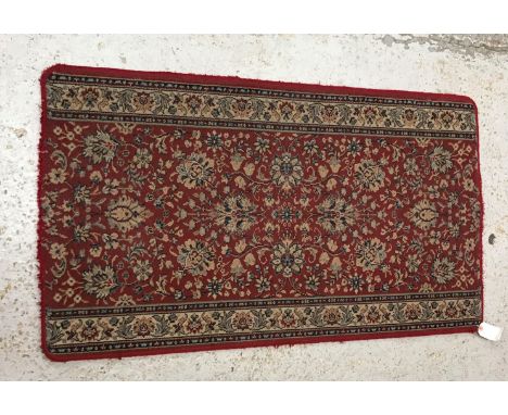 A collection of various small rugs to include a vintage Chinese rug, the central panel set with pagoda style decoration withi