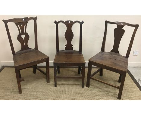 Four various stick back chairs each with pierced centre splats, one with wheel, one with star, one with medallion, the other 