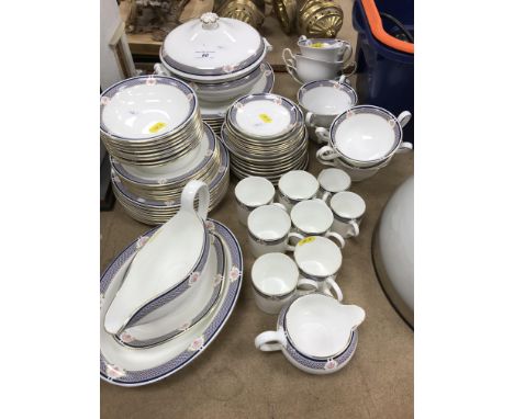 A Wedgwood Waverley part dinner service comprising eight dinner plates, eight salad plates, eight side plates, eight bowls, e
