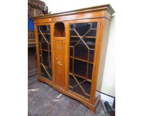 A high quality Edwardian satinwood display cabinet, the central door with painted detail showing garlands, flowers, instrumen