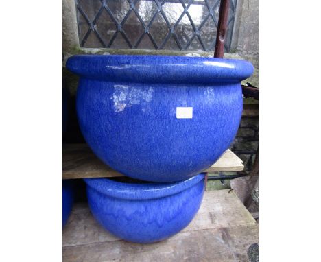 A pair of ceramic planters, 50 cm diameter
