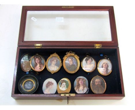 A quantity of 19th century and later portrait miniatures, all of oval form, including a bearded male character, various femal