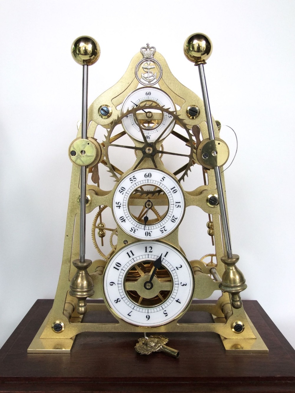 Devon Clocks skeleton mantel clock, with original Devon Clocks key, the brass clock m
