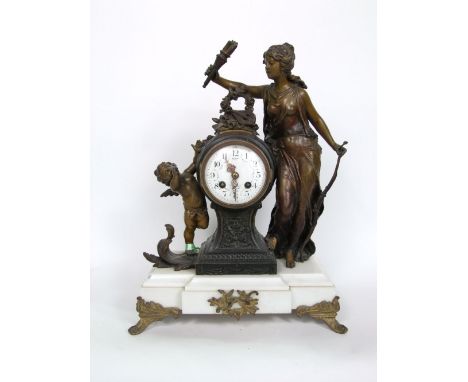 French cast Spelter figural drum head mantle clock, the two train enamel painted dial inscribed 'Rue Grebilos, Nantes' flanke