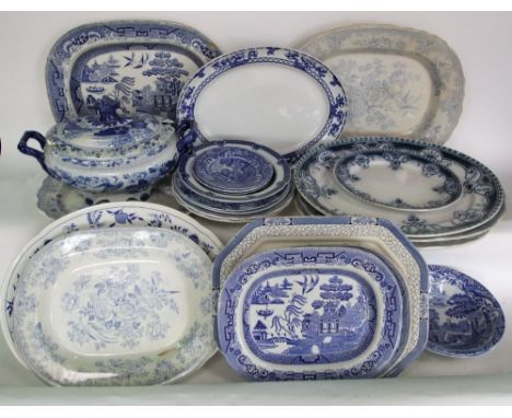 A quantity of 19th century and other blue and white printed ceramics including a large two handled soup tureen and cover, mar