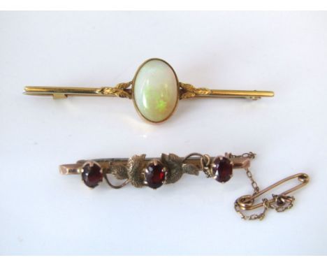 Two 9ct bar brooches, one set with garnets and the other with a large opal, in original box, 4g