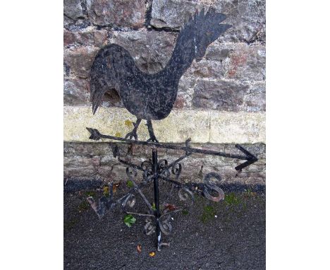 A weather vane in the form of a cockerel