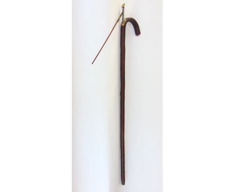 A horse measuring stick fitted with a steel ruler and spirit level.