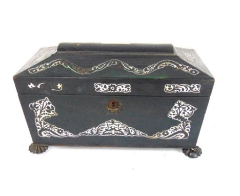 A Victorian mother of pearl inlaid sarcophagus tea caddy with ring handles, hinged lid enclosing two domed containers and sha
