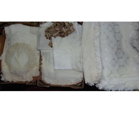 Three boxes of household  linen including lace bedspread, curtain tie backs and curtain netting together with a standard lamp