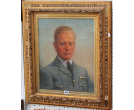 A mid 20th century shoulder length pastel portrait of a young man in Royal Air Force uniform, indistinctly signed bottom righ