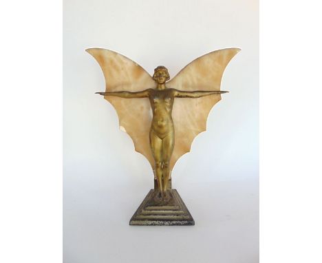 An Art Deco gilt spelter figural table lamp in the form of a nude with marble butterfly wings upon a stepped square plinth ba