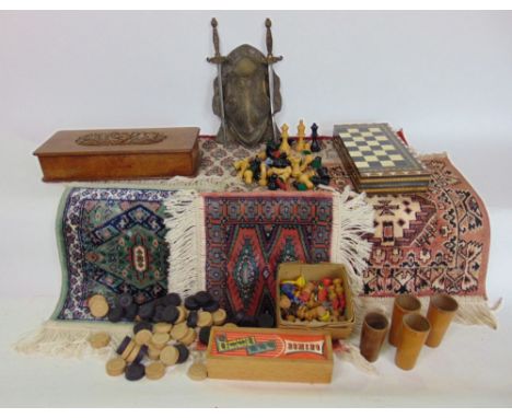 A collection of miscellaneous items comprising a box of vintage games to include a folding travelling checkers board and ches