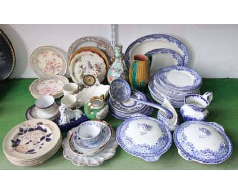 A collection of early 20th century Brittannia pottery Peony pattern blue and white printed dinner wares including a pair of t