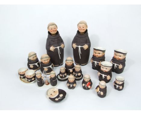 A collection of Goebel Monk wares comprising a pair of bottles and stoppers, four jugs, a pair of pots and covers, a condimen
