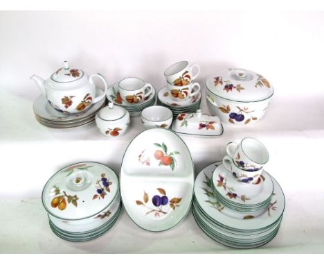 A quantity of Royal Worcester Evesham pattern dinner and tea wares including a pair of tureens and covers, tea pot, butter di