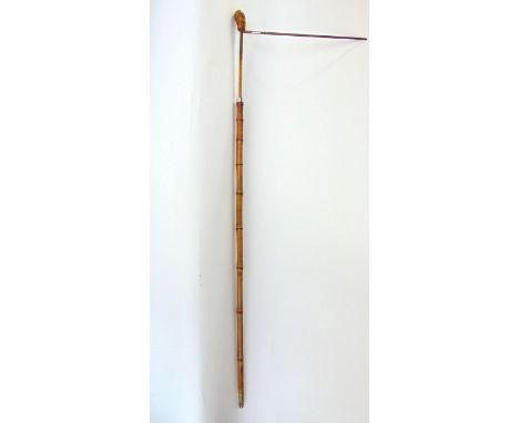 A good bamboo and hawthorn horse measuring stick fitted with a ruler and spirit level.