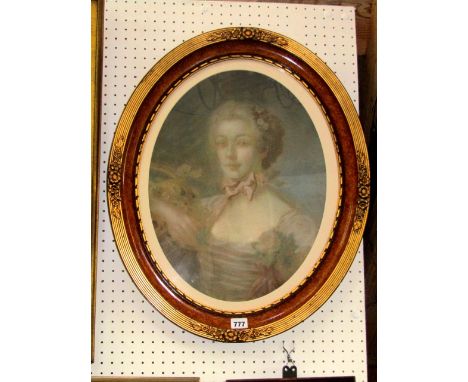 A bust length portrait study of oval form showing a lady in 18th century style costume holding flowers, 45cm max in burrwood 