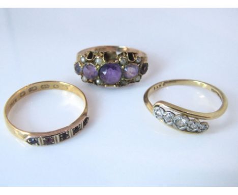 Three gold rings comprising a 22ct ruby example, an 18ct diamond ring and a 9ct amethyst and seed pearl ring. Sizes O, L/M an