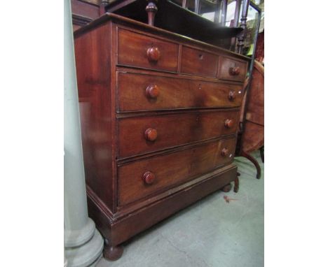 A mid 19th century mahogany chest of three long and three short drawers on bracket supports