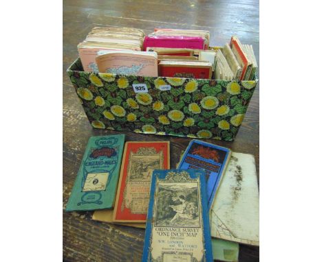 A box containing a collection of late 20th century and other mixed Ordnance Survey maps.