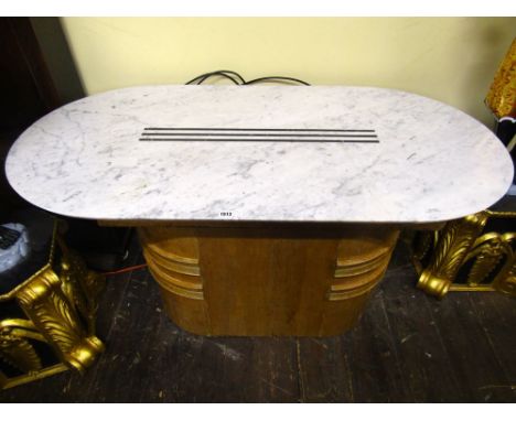 An Art Deco style low centre table, the oval decorative white, grey, flecked and veined marble top with central triple line i