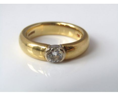 An 18ct bezel set diamond ring 0.25cts approx, size M, 8g